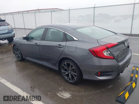 2021 Honda Civic Sedan Sport with VIN 2HGFC2F87MH548249, listed as a IAAI auction lot 41471400 with 79,553 mi miles. Bid and sale history available at carsss.com. Image 3.