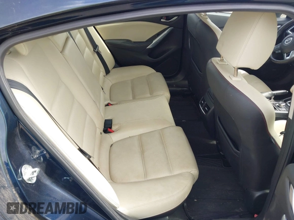 2015 Mazda 6 i Grand Touring with VIN JM1GJ1W53F1200121, listed as a IAAI auction lot 42173036 with 76,184 mi miles and . Bid and sale history available at DreamBid. Image 8.
