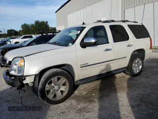 2011 GMC Yukon SLT with VIN 1GKS1CE01BR131442, listed as a Copart auction lot 79490004 with 211,307 mi miles and Salvage Title. Bid and sale history available at carsss.com. Image 1.