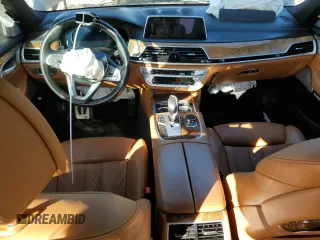 2018 BMW 7 Series 750i with VIN WBA7F0C57JGM23040, listed as a Copart auction lot 87392704 with 0 mi miles and Salvage Title. Bid and sale history available at carsss.com. Image 8.