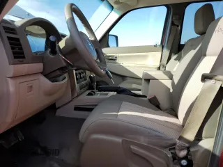 2009 Jeep Liberty Sport with VIN 1J8GN28K39W546893, listed as a Copart auction lot 55110965 with 222,716 mi miles and Clean Title. Bid and sale history available at carsss.com. Image 7.