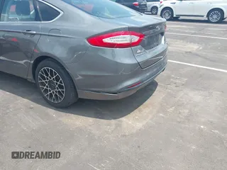 2013 Ford Fusion SE z VIN 3FA6P0HR7DR229960, wystawiony jako IAAI lot #42433104 z przebiegiem 167 485 mil mil oraz . Historia ofert i sprzedaży dostępna na DreamBid. Obrazek 6.