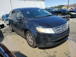 2011 Honda Odyssey EX-L with VIN 5FNRL5H69BB080861, listed as a Copart auction lot 53690005 with 206,646 mi miles and Salvage Title. Bid and sale history available at DreamBid. Image 4.