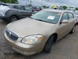 2006 Buick Lucerne CX with VIN 1G4HP57276U179671, listed as a IAAI auction lot 42167318 with 126,872 mi miles. Bid and sale history available at carsss.com. Image 2.