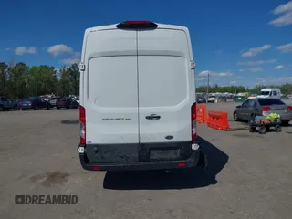 2022 Ford Transit Cargo with VIN 1FTBW3X80NKA69156, listed as a IAAI auction lot 42059236 with 100,096 mi miles and . Bid and sale history available at DreamBid. Image 16.