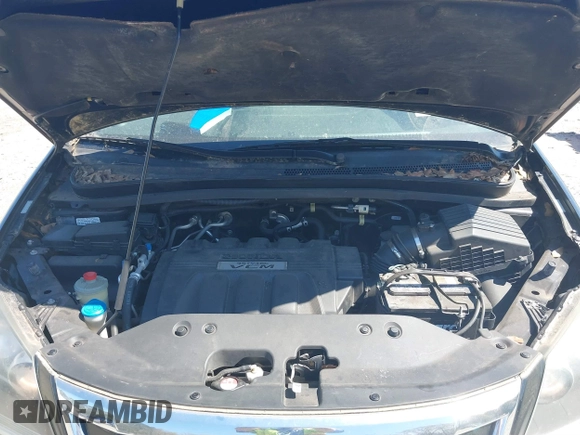 2010 Honda Odyssey EX-L with VIN 5FNRL3H65AB102230, listed as a IAAI auction lot 41888728 with 154,164 mi miles and . Bid and sale history available at DreamBid. Image 10.