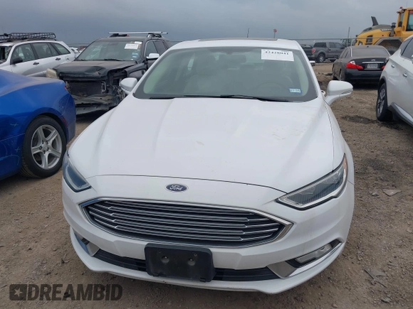 2017 Ford Fusion Titanium z VIN 3FA6P0K96HR124146, wystawiony jako IAAI lot #42428041 z przebiegiem 204 306 mil mil oraz . Historia ofert i sprzedaży dostępna na DreamBid. Obrazek 6.