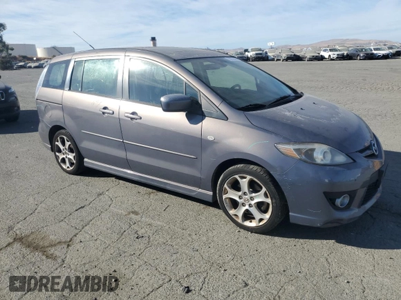 2009 Mazda 5 Sport with VIN JM1CR29L290348021, listed as a Copart auction lot 75912434 with 84,022 mi miles and Salvage title. Bid and sale history available at DreamBid. Image 4.