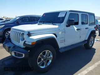 2020 Jeep Wrangler Unlimited Sahara with VIN 1C4HJXEN5LW277208, listed as a IAAI auction lot 41640906 with 61,774 mi miles. Bid and sale history available at carsss.com. Image 17.