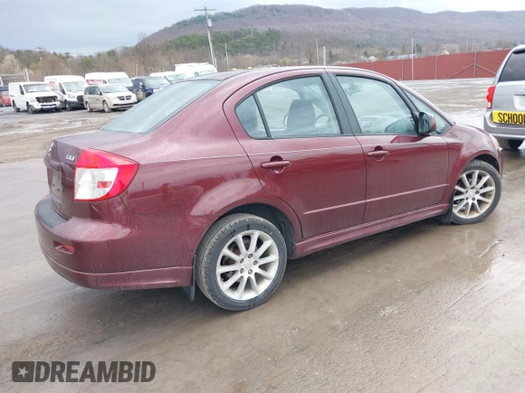 2008 Suzuki SX4 Sport z VIN JS2YC414985100007, wystawiony jako IAAI lot #41849082 z przebiegiem 157 595 mil mil oraz . Historia ofert i sprzedaży dostępna na DreamBid. Obrazek 4.