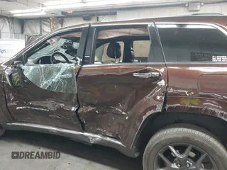 2014 Jeep Grand Cherokee Summit with VIN 1C4RJFJT6EC346575, listed as a IAAI auction lot 41881795 with 148,941 mi miles and . Bid and sale history available at DreamBid. Image 6.