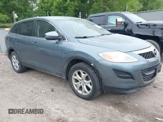 2011 Mazda CX-9 Touring z VIN JM3TB3CA4B0329565, wystawiony jako IAAI lot #42495500 z przebiegiem 172 483 mil mil oraz . Historia ofert i sprzedaży dostępna na DreamBid. Obrazek 1.
