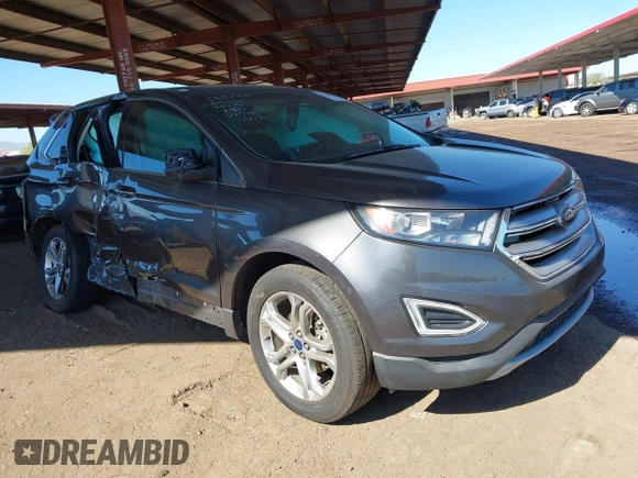 2015 Ford Edge Titanium z VIN 2FMTK3K90FBC12582, wystawiony jako IAAI lot #41860973 z przebiegiem Nie podano mil oraz . Historia ofert i sprzedaży dostępna na DreamBid. Obrazek 1.