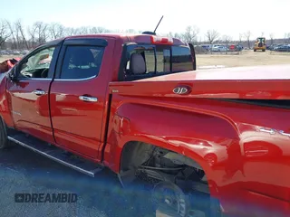 2015 GMC Canyon 4WD SLT z VIN 1GTG6CE38F1266466, wystawiony jako IAAI lot #41822501 z przebiegiem 26 479 mil mil oraz . Historia ofert i sprzedaży dostępna na DreamBid. Obrazek 15.