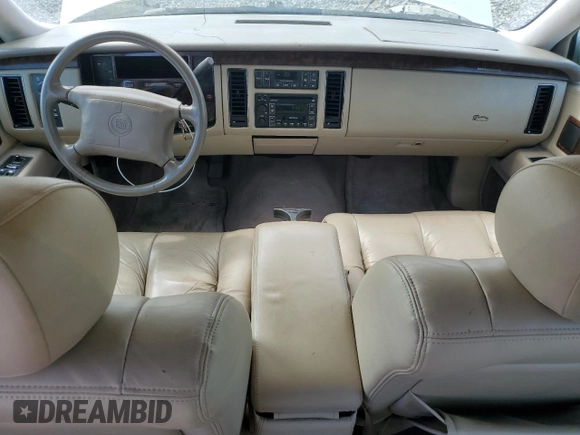 1996 Cadillac Fleetwood z VIN 1G6DW52P1TR715038, wystawiony jako Copart lot #69987194 z przebiegiem Nie podano mil oraz Szkody całkowita. Historia ofert i sprzedaży dostępna na DreamBid. Obrazek 8.