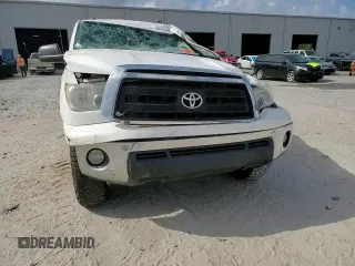 2010 Toyota Tundra z VIN 5TFRM5F10AX019942, wystawiony jako Copart lot #52418865 z przebiegiem Nie podano mil oraz Szkoda całkowita • Salvage title. Historia ofert i sprzedaży dostępna na DreamBid. Obrazek 11.