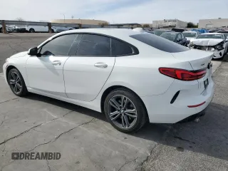 2021 BMW 2 Series 228i xDrive with VIN WBA73AK00M7G52266, listed as a Copart auction lot 87717915 with 63,575 mi miles and Salvage Title. Bid and sale history available at DreamBid. Image 2.