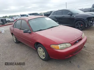 1997 Ford Escort LX with VIN 1FALP13P2VW392173, listed as a IAAI auction lot 41833271 with 123,991 mi miles. Bid and sale history available at carsss.com. Image 1.