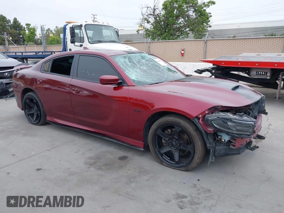 2019 Dodge Charger R/T with VIN 2C3CDXCT2KH749207, listed as a IAAI auction lot 42120658 with 52,330 mi miles and . Bid and sale history available at carsss.com. Image 1.