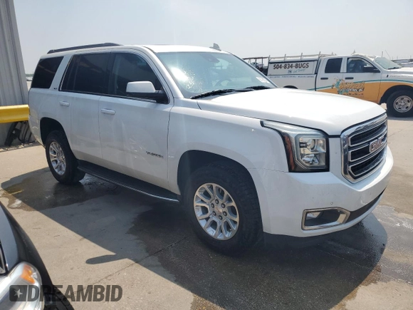 2020 GMC Yukon SLT with VIN 1GKS1BKC0LR243224, listed as a Copart auction lot 65768234 with 129,702 mi miles and Salvage Title. Bid and sale history available at DreamBid. Image 4.
