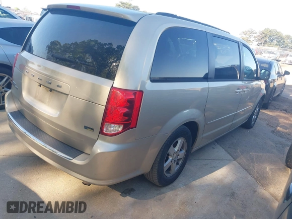 2013 Dodge Grand Caravan SXT with VIN 2C4RDGCGXDR553019, listed as a IAAI auction lot 42053186 with 341,864 mi miles and . Bid and sale history available at DreamBid. Image 4.