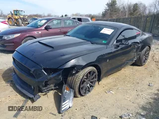 2016 Ford Mustang V6 with VIN 1FA6P8AMXG5222893, listed as a IAAI auction lot 41754837 with 52,892 mi miles and . Bid and sale history available at carsss.com. Image 18.