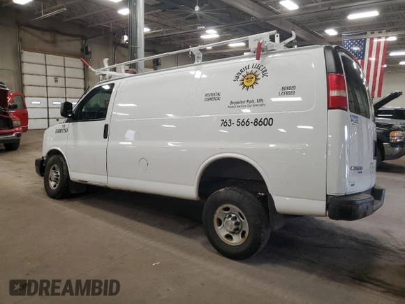 2014 Chevrolet Express Cargo Van with VIN 1GCWGFCA0E1131959, listed as a Copart auction lot 79602464 with 0 mi miles and Salvage Title. Bid and sale history available at carsss.com. Image 2.