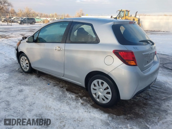 2015 Toyota Yaris L with VIN VNKJTUD36FA036518, listed as a IAAI auction lot 41233406 with 138,481 mi miles. Bid and sale history available at carsss.com. Image 3.