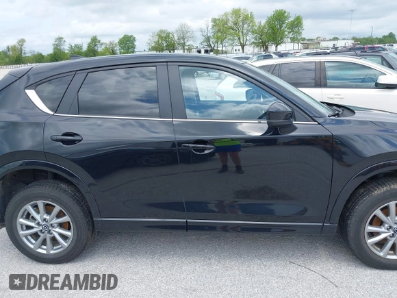 2024 Mazda CX-5 S Select with VIN JM3KFBBL1R0503003, listed as a IAAI auction lot 42149860 with 23,133 mi miles and . Bid and sale history available at DreamBid. Image 14.