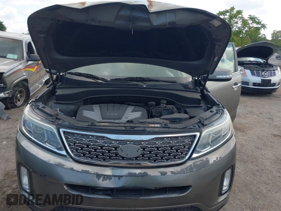 2014 Kia Sorento SX z VIN 5XYKWDA75EG461948, wystawiony jako IAAI lot #42180084 z przebiegiem 123 917 mil mil oraz . Historia ofert i sprzedaży dostępna na DreamBid. Obrazek 10.