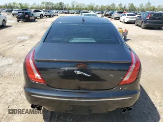 2013 Jaguar XJ with VIN SAJWA3HE9DMV49768, listed as a Copart auction lot 50339955 with 56,841 mi miles and Salvage Title. Bid and sale history available at DreamBid. Image 6.
