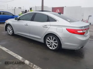 2014 Hyundai Azera Limited with VIN KMHFH4JG7EA388931, listed as a IAAI auction lot 41468407 with 130,597 mi miles and . Bid and sale history available at DreamBid. Image 3.