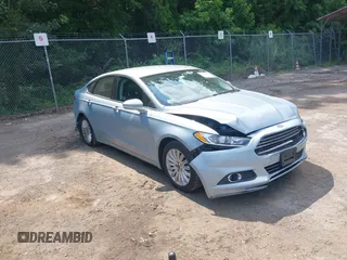 2014 Ford Fusion SE Hybrid with VIN 3FA6P0LU5ER223359, listed as a IAAI auction lot 42686093 with 96,938 mi miles and . Bid and sale history available at DreamBid. Image 1.