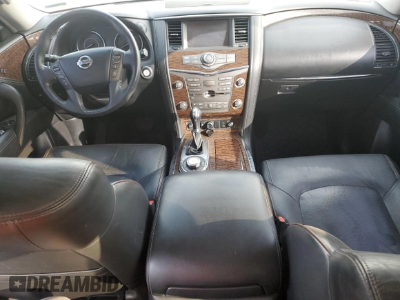 2017 Nissan Armada Platinum z VIN JN8AY2NE2H9700319, wystawiony jako Copart lot #51859735 z przebiegiem Nie podano mil oraz Szkoda całkowita • Salvage title. Historia ofert i sprzedaży dostępna na DreamBid. Obrazek 8.