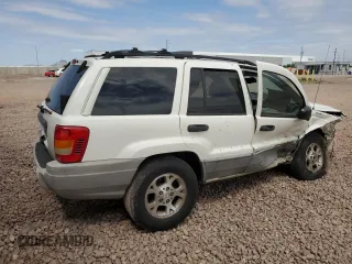 2000 Jeep Grand Cherokee Laredo with VIN 1J4G248S4YC222194, listed as a Copart auction lot 53809825 with Not provided miles and Salvage title. Bid and sale history available at DreamBid. Image 3.