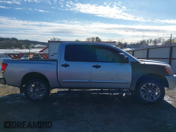 2011 Nissan Titan Pro-4X with VIN 1N6BA0EC8BN304544, listed as a IAAI auction lot 41329674 with 235,319 mi miles and . Bid and sale history available at DreamBid. Image 14.
