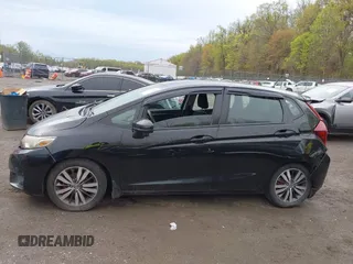 2015 Honda Fit EX-L with VIN 3HGGK5H88FM726406, listed as a IAAI auction lot 42033501 with 124,216 mi miles. Bid and sale history available at carsss.com. Image 14.