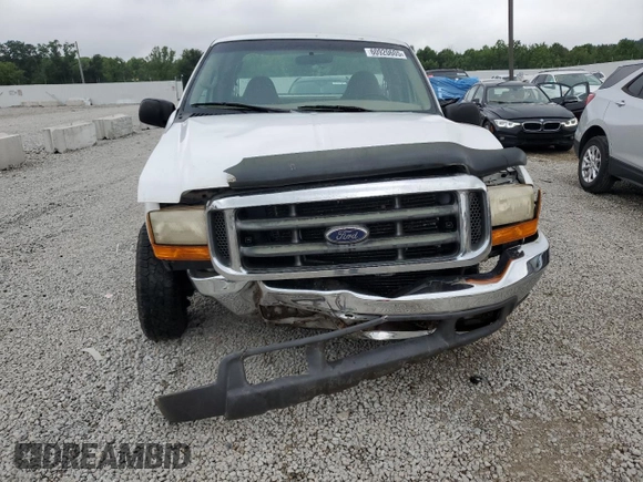 1999 Ford F-250 XL with VIN 1FTNX20S1XEB68189, listed as a Copart auction lot 60920605 with 209,822 mi miles and Salvage title. Bid and sale history available at DreamBid. Image 5.