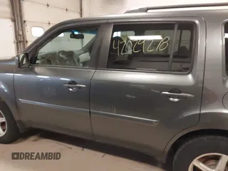 2011 Honda Pilot EX-L with VIN 5FNYF4H55BB039079, listed as a IAAI auction lot 42029278 with 173,216 mi miles. Bid and sale history available at carsss.com. Image 14.