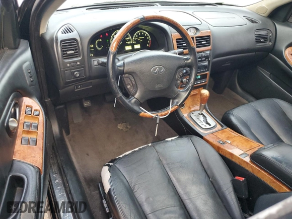 2004 Infiniti I35 z VIN JNKDA31A54T212810, wystawiony jako Copart lot #72467654 z przebiegiem 137 809 mil mil oraz Szkoda całkowita • Salvage title. Historia ofert i sprzedaży dostępna na DreamBid. Obrazek 8.