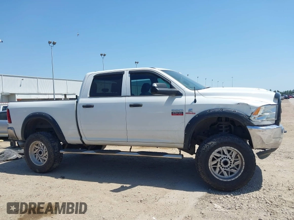 2012 Ram 2500 ST z VIN 3C6UD5CLXCG301343, wystawiony jako IAAI lot #42009239 z przebiegiem 139 514 mil mil oraz . Historia ofert i sprzedaży dostępna na DreamBid. Obrazek 13.