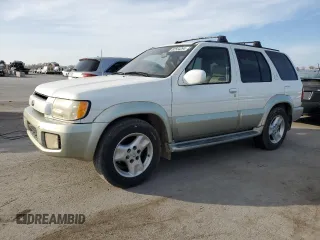 2001 Infiniti QX4 Luxury z VIN JNRDR07Y41W103360, wystawiony jako Copart lot #82564294 z przebiegiem 229 439 mil mil oraz Tytuł czysty. Historia ofert i sprzedaży dostępna na DreamBid. Obrazek 1.