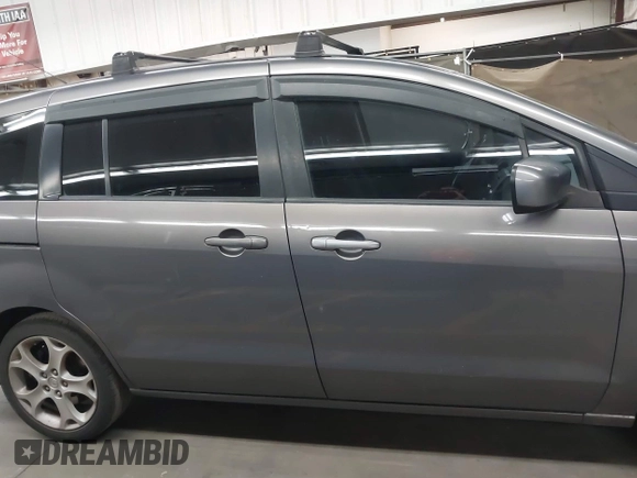 2010 Mazda 5 Sport with VIN JM1CR2WL8A0361879, listed as a IAAI auction lot 42174918 with 179,058 mi miles and . Bid and sale history available at DreamBid. Image 14.