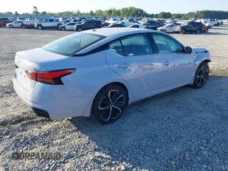 2025 Nissan Altima SR with VIN 1N4BL4CV7SN354284, listed as a IAAI auction lot 42067312 with 15,000 mi miles and . Bid and sale history available at DreamBid. Image 4.
