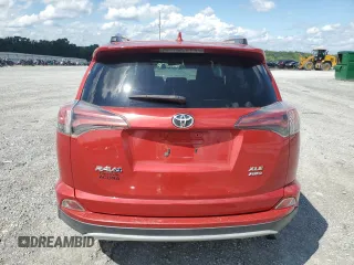 2016 Toyota RAV4 XLE with VIN 2T3RFREV7GW421217, listed as a Copart auction lot 64249145 with 133,722 mi miles and Clean title. Bid and sale history available at DreamBid. Image 6.