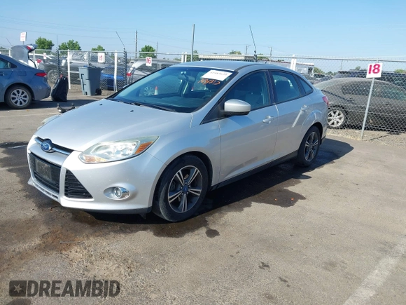 2012 Ford Focus SE z VIN 1FAHP3F28CL215997, wystawiony jako IAAI lot #42483639 z przebiegiem 101 518 mil mil oraz . Historia ofert i sprzedaży dostępna na DreamBid. Obrazek 17.