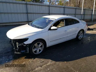 2014 Volkswagen CC Sport with VIN WVWBN7AN4EE525005, listed as a Copart auction lot 41372125 with 104,646 mi miles and Salvage Title. Bid and sale history available at carsss.com. Image 1.
