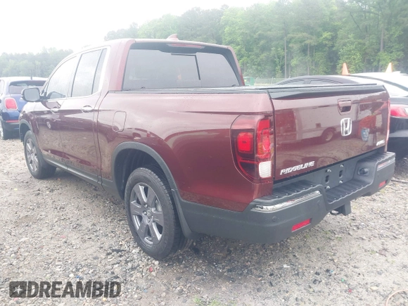 2020 Honda Ridgeline RTL-E with VIN 5FPYK3F7XLB012298, listed as a IAAI auction lot 42230880 with 48,252 mi miles and . Bid and sale history available at DreamBid. Image 3.