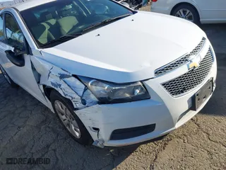 2013 Chevrolet Cruze LS with VIN 1G1PA5SG1D7252963, listed as a IAAI auction lot 41678640 with 139,564 mi miles. Bid and sale history available at carsss.com. Image 6.