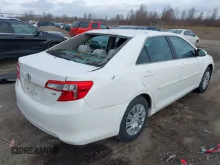 2014 Toyota Camry L with VIN 4T4BF1FKXER374901, listed as a IAAI auction lot 41861839 with 130,990 mi miles and . Bid and sale history available at DreamBid. Image 4.